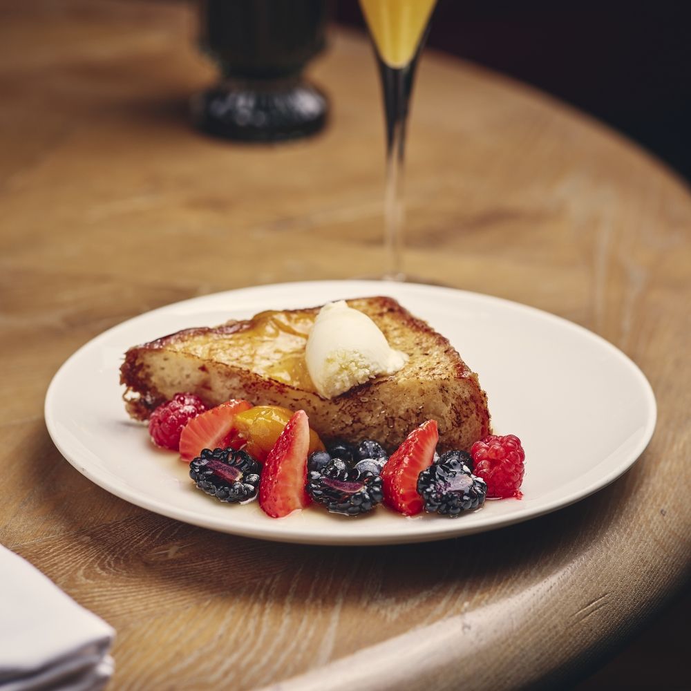 Indulge in a hearty and sumptuous English breakfast fit for royalty at the Sofitel London St James. This exquisite culinary masterpiece is a true feast for the senses, showcasing the finest British ingredients and impeccable presentation.
